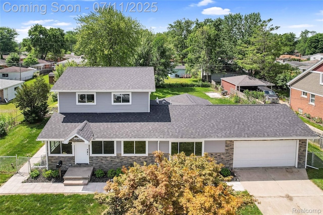22222 Evergreen St, Macomb, MI 48082 - view of front of home featuring roof with shingles, stone siding, a garage, and driveway