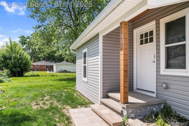 22222 Evergreen St, Macomb, MI 48082 - view of exterior entry with a lawn