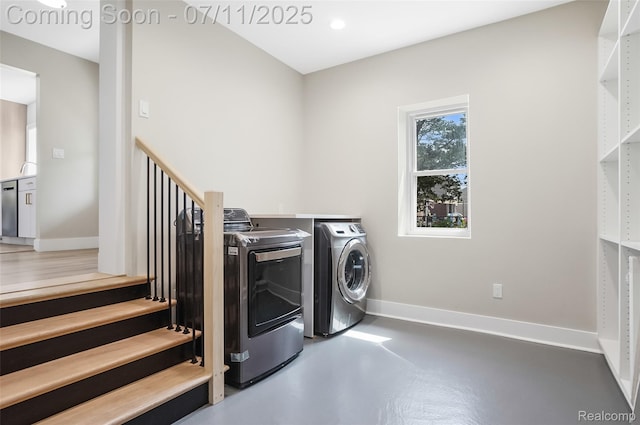 22222 Evergreen St, Macomb, MI 48082 - washroom featuring washing machine and dryer and baseboards