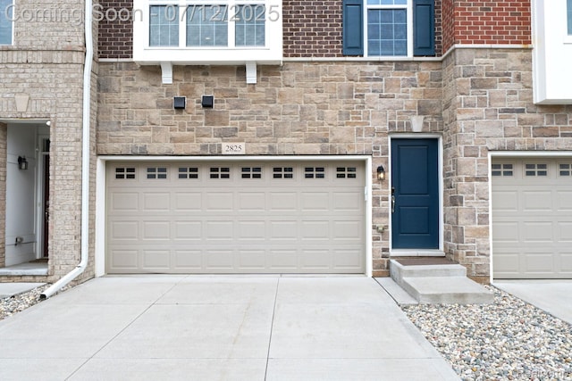 2825 Ridington Rd, Ann Arbor, MI 48105 - garage featuring concrete driveway