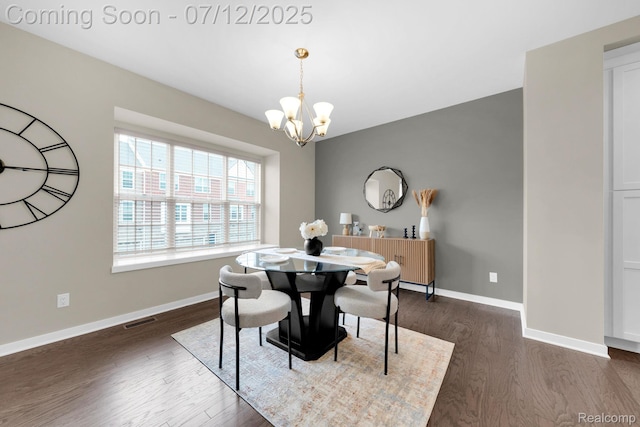 2825 Ridington Rd, Ann Arbor, MI 48105 - dining area with dark wood-style floors and a chandelier