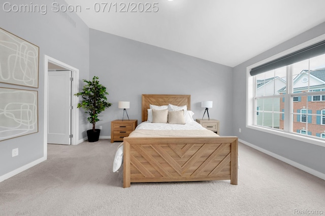 2825 Ridington Rd, Ann Arbor, MI 48105 - bedroom featuring light carpet and vaulted ceiling