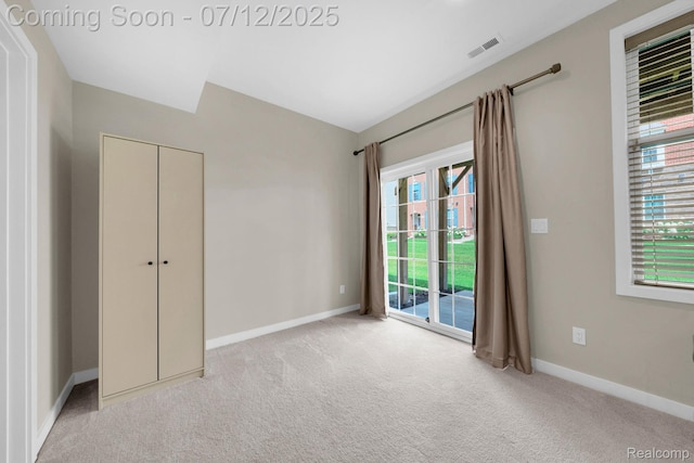 2825 Ridington Rd, Ann Arbor, MI 48105 - unfurnished bedroom with access to outside and carpet