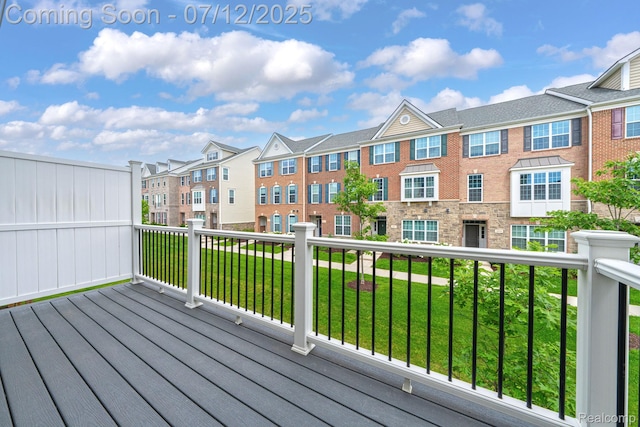 2825 Ridington Rd, Ann Arbor, MI 48105 - deck featuring a lawn and a residential view