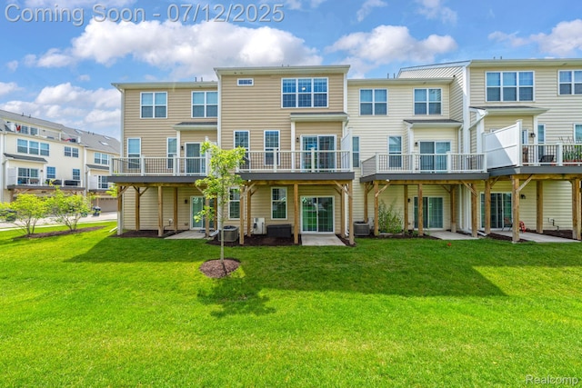 2825 Ridington Rd, Ann Arbor, MI 48105 - back of house with a yard and a deck
