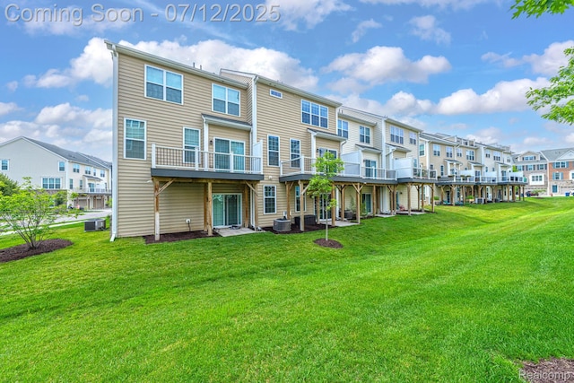 2825 Ridington Rd, Ann Arbor, MI 48105 - back of property featuring a residential view and a yard