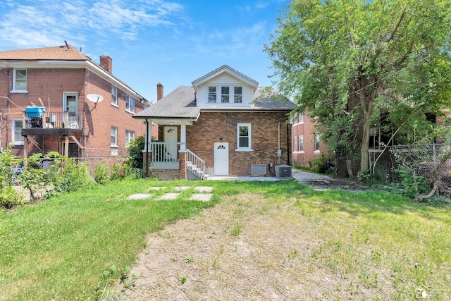 2651 Lakewood St, Detroit, MI 48215 - view of front of house featuring brick siding and a chimney