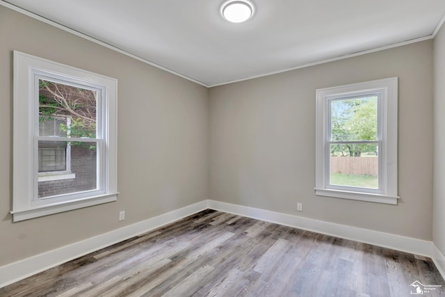2651 Lakewood St, Detroit, MI 48215 - empty room featuring ornamental molding and wood finished floors