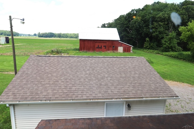 11731 Birch Run Rd, Birch Run, MI 48415 - exterior view of a barn, a shingled roof, a downspout, and gutters