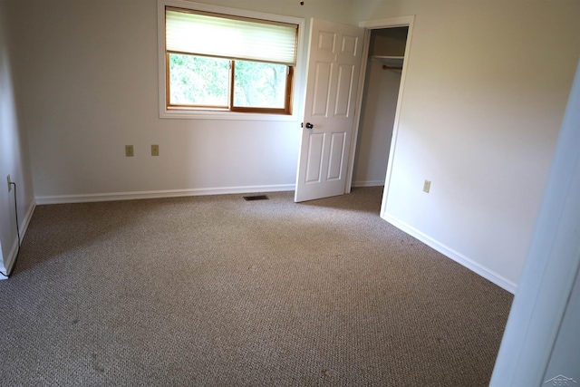 11731 Birch Run Rd, Birch Run, MI 48415 - unfurnished bedroom featuring carpet and a closet