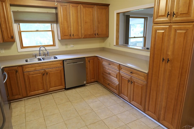 11731 Birch Run Rd, Birch Run, MI 48415 - kitchen featuring dishwasher, brown cabinetry, plenty of natural light, and light tile patterned flooring