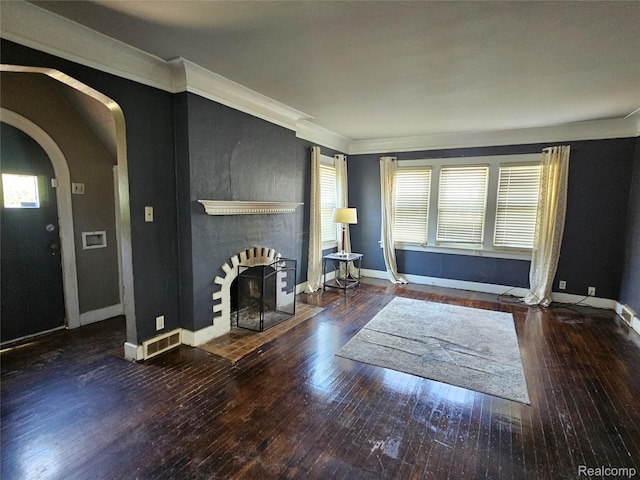 607 Roome Ct, Flint, MI 48503 - living area with arched walkways, hardwood / wood-style flooring, healthy amount of natural light, and crown molding