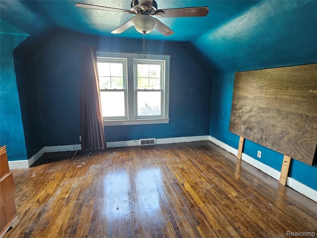 607 Roome Ct, Flint, MI 48503 - bonus room with lofted ceiling, hardwood / wood-style flooring, and a ceiling fan