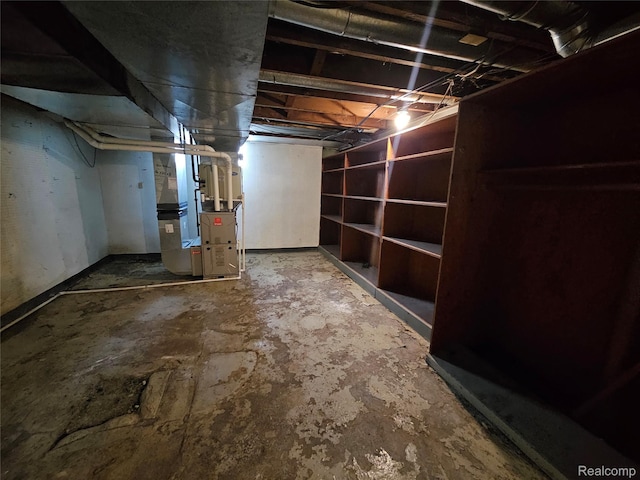 607 Roome Ct, Flint, MI 48503 - unfinished below grade area with heating unit