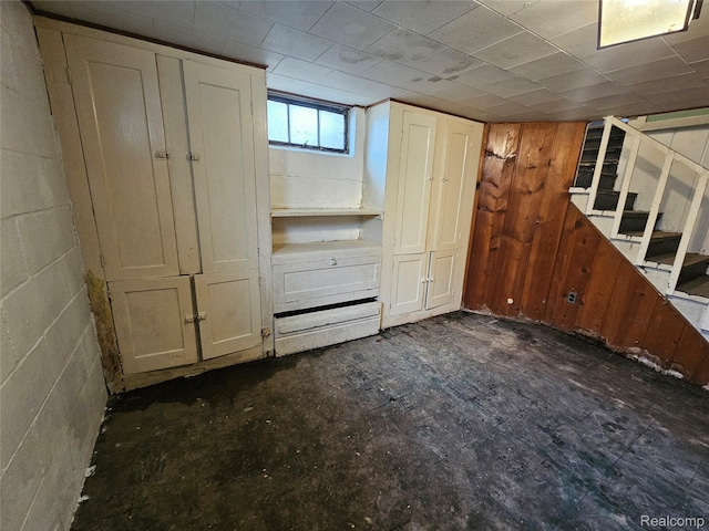 607 Roome Ct, Flint, MI 48503 - below grade area with stairway and concrete block wall