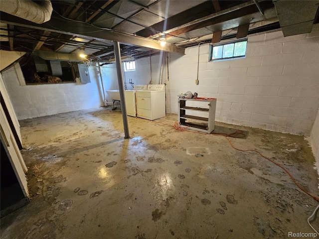 607 Roome Ct, Flint, MI 48503 - basement with washing machine and dryer and electric panel