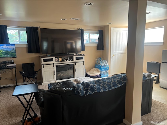 33158 Shawnee St, Westland, MI 48185 - living room featuring a glass covered fireplace and recessed lighting