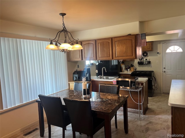 33158 Shawnee St, Westland, MI 48185 - dining room with a chandelier