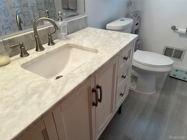 33158 Shawnee St, Westland, MI 48185 - bathroom with wood finished floors and vanity