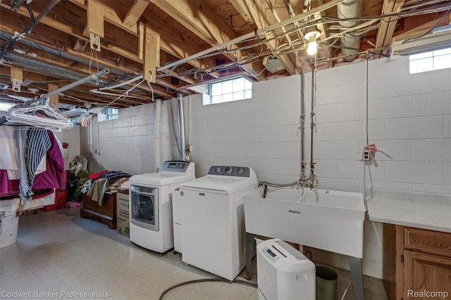 21600 Eastbrook Ct, Grosse Pointe Woods, MI 48236 - laundry room with washer and dryer, plenty of natural light, light flooring, and concrete block wall
