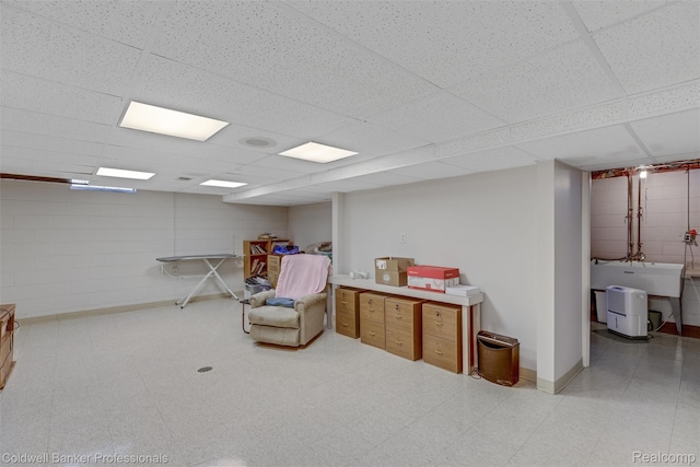 21600 Eastbrook Ct, Grosse Pointe Woods, MI 48236 - rec room with light floors, a drop ceiling, and concrete block wall