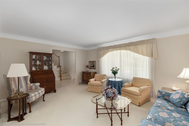 21600 Eastbrook Ct, Grosse Pointe Woods, MI 48236 - carpeted living area with stairs and baseboards