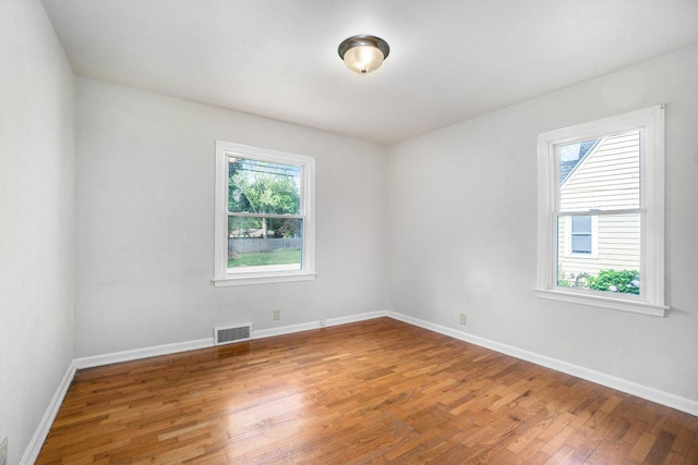 932 Parker Ave, Kalamazoo, MI 49008 - spare room featuring light wood finished floors and baseboards