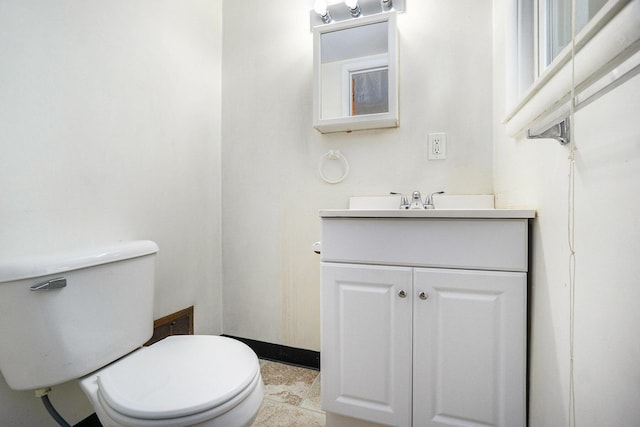 932 Parker Ave, Kalamazoo, MI 49008 - half bath featuring vanity and toilet