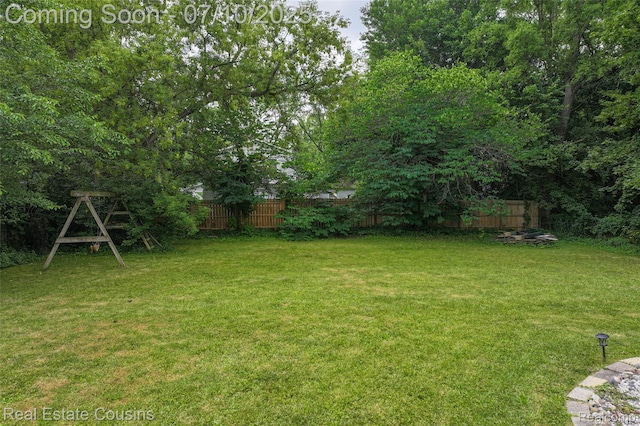 135 Bevins St, Holly, MI 48442 - view of yard