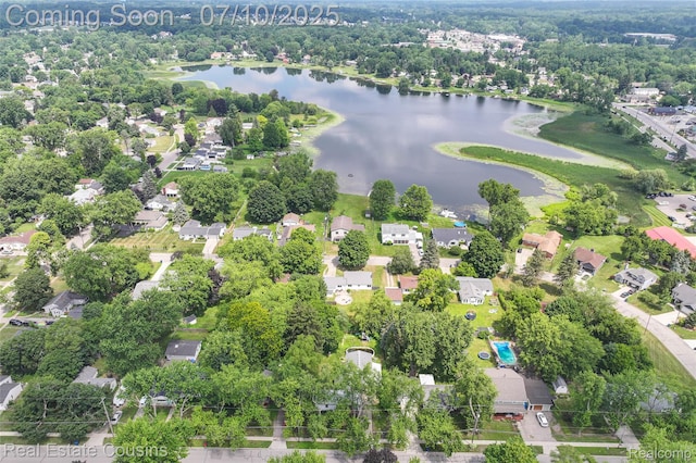 135 Bevins St, Holly, MI 48442 - aerial view of residential area featuring a nearby body of water