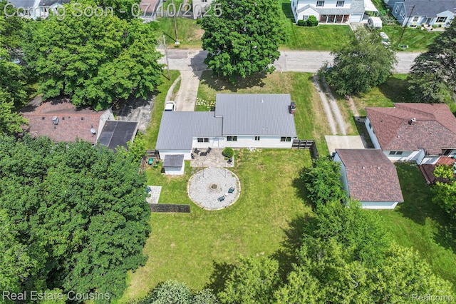 135 Bevins St, Holly, MI 48442 - aerial view of property and surrounding area with nearby suburban area