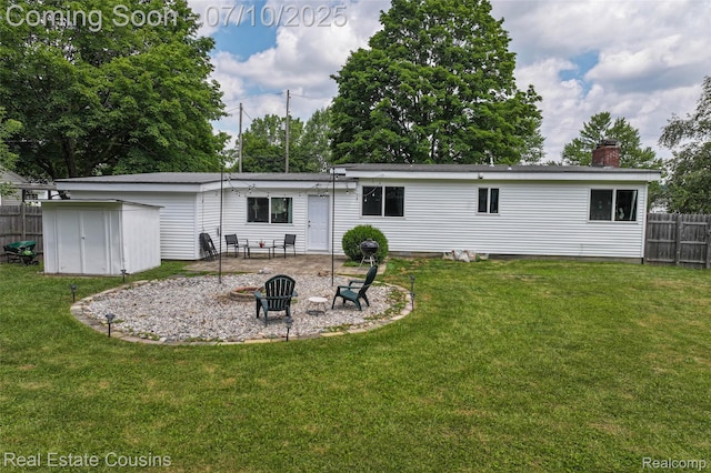 135 Bevins St, Holly, MI 48442 - rear view of house with a patio, a chimney, and a storage unit