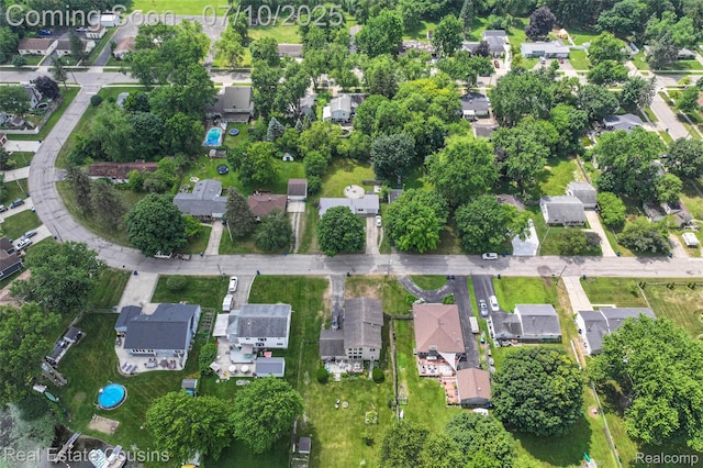 135 Bevins St, Holly, MI 48442 - aerial view of property and surrounding area with nearby suburban area