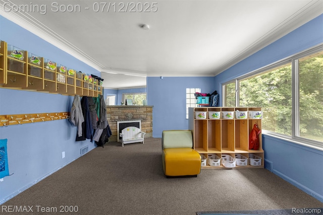 27055 Ann Arbor Trl, Dearborn Heights, MI 48127 - bedroom with crown molding, carpet flooring, and a fireplace