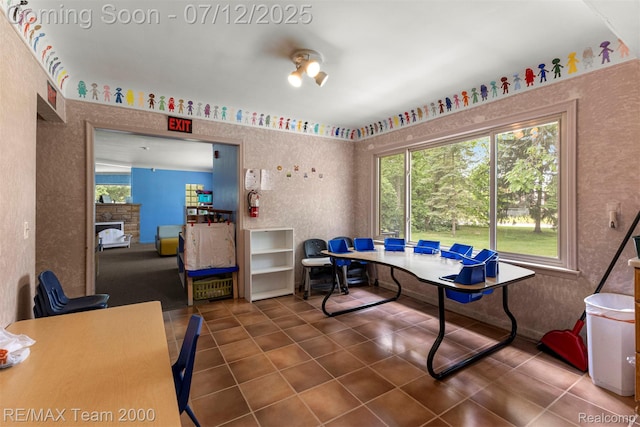 27055 Ann Arbor Trl, Dearborn Heights, MI 48127 - office area featuring wallpapered walls, tile patterned flooring, and a fireplace