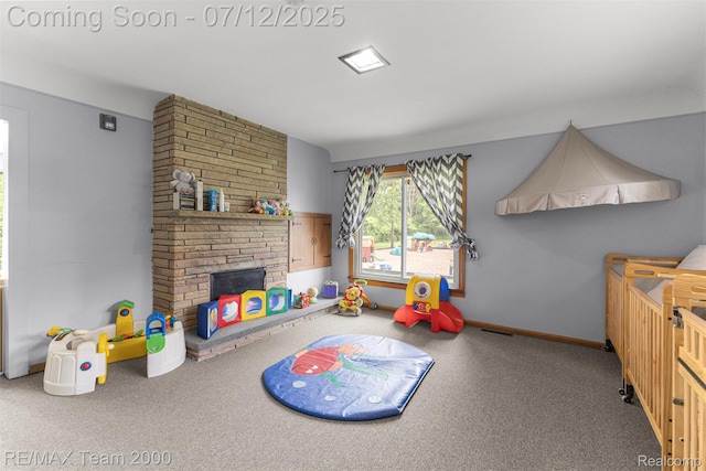 27055 Ann Arbor Trl, Dearborn Heights, MI 48127 - recreation room featuring a fireplace and carpet flooring
