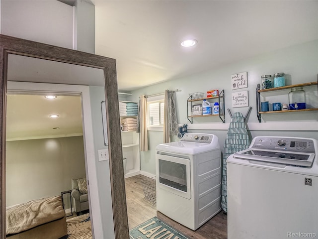 1454 Stephens Ave, Flint, MI 48507 - washroom with separate washer and dryer, wood finished floors, recessed lighting, and ornamental molding