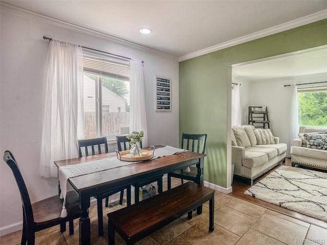 1454 Stephens Ave, Flint, MI 48507 - dining space featuring ornamental molding and light tile patterned floors