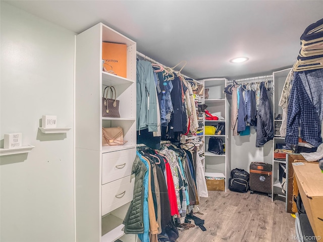 1454 Stephens Ave, Flint, MI 48507 - walk in closet with wood finished floors