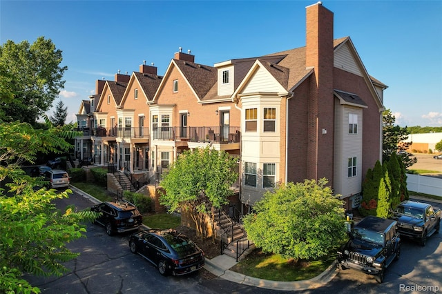 41666 Tera Ln, Novi, MI 48375 - view of building exterior with stairway and a residential view