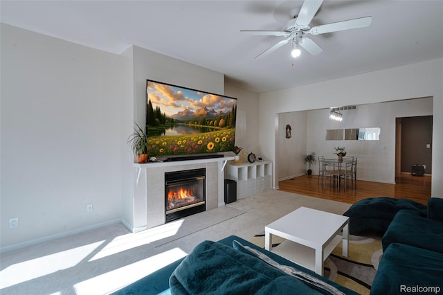 41666 Tera Ln, Novi, MI 48375 - living room featuring ceiling fan and a tiled fireplace