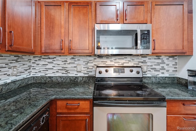 41666 Tera Ln, Novi, MI 48375 - kitchen featuring appliances with stainless steel finishes, decorative backsplash, brown cabinetry, and dark stone countertops