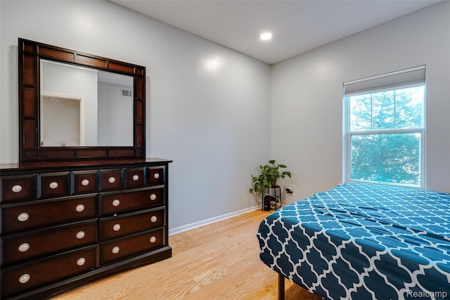 41666 Tera Ln, Novi, MI 48375 - bedroom with wood finished floors and baseboards