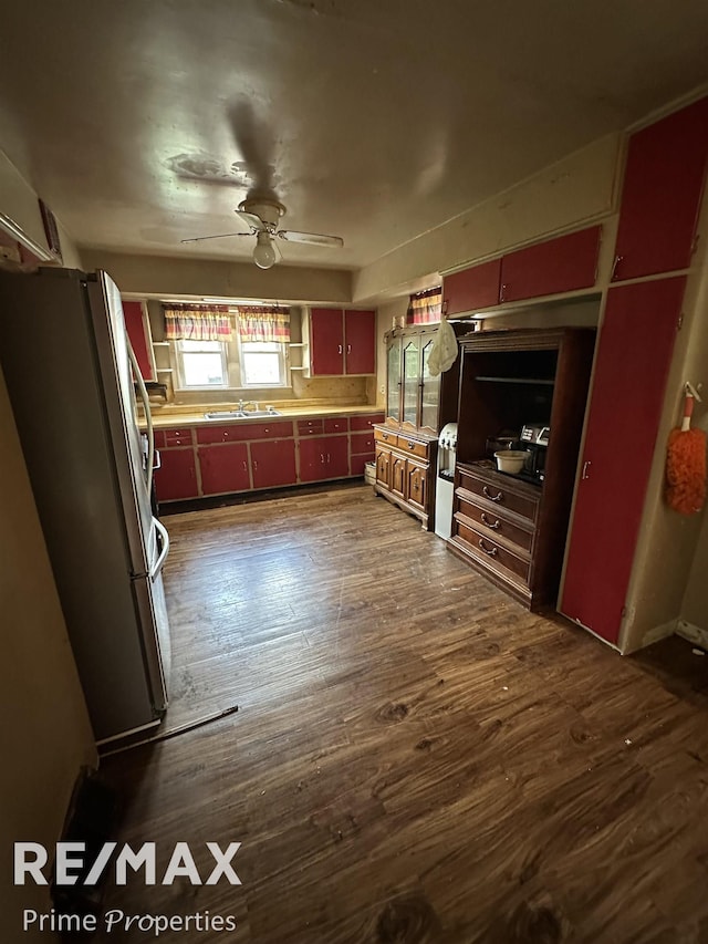 1615 Pound Dr, Flint, MI 48532 - unfurnished living room featuring a ceiling fan and dark wood finished floors