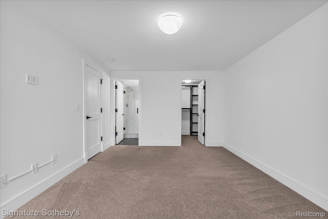 411 S Old Woodward Ave Unit 924, Birmingham, MI 48009 - unfurnished bedroom with carpet floors and a spacious closet