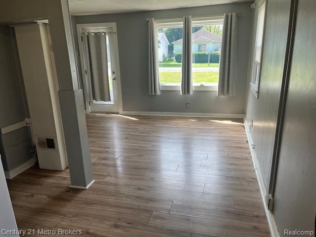 2117 E Buder Ave, Flint, MI 48529 - empty room featuring wood finished floors and baseboards