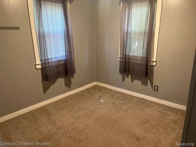 2117 E Buder Ave, Flint, MI 48529 - carpeted spare room with baseboards