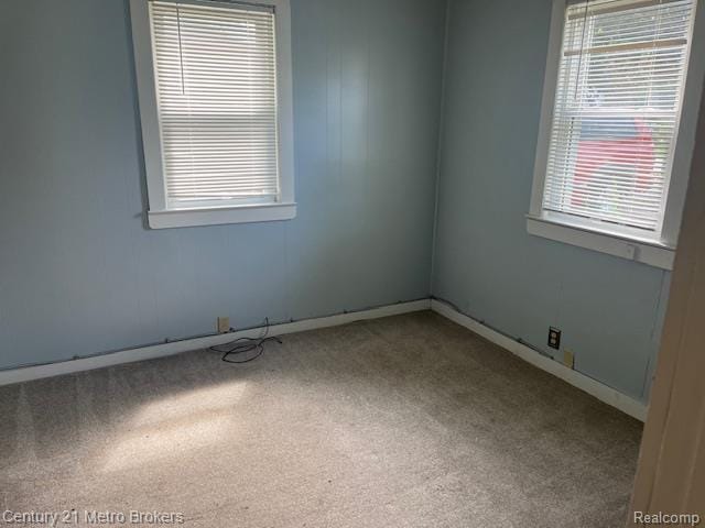 2117 E Buder Ave, Flint, MI 48529 - unfurnished room featuring carpet floors and baseboards