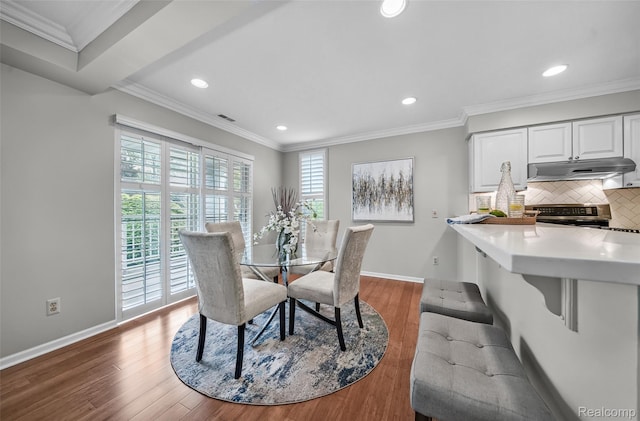 3553 Port Cove Dr Unit 39, Waterford, MI 48328 - dining room with recessed lighting, wood finished floors, and crown molding