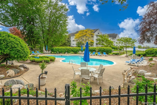 3553 Port Cove Dr Unit 39, Waterford, MI 48328 - community pool featuring a patio